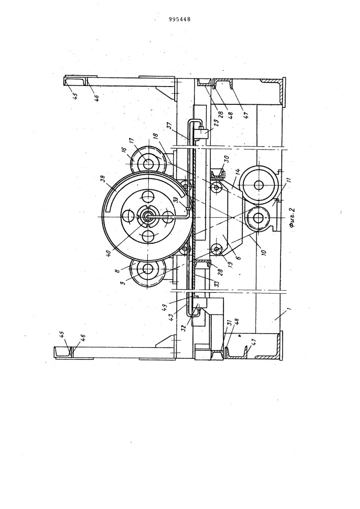 Устройство для наложения слоев корда на сборочный барабан (патент 995448)